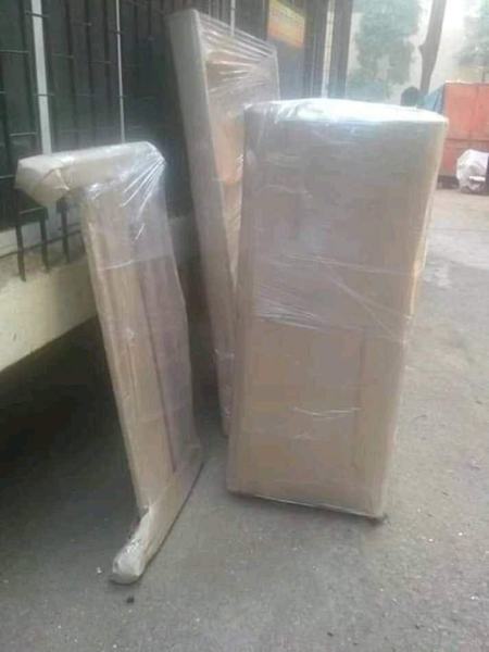 Wardrobe wrapped in stretch film – packers and movers in Lucknow