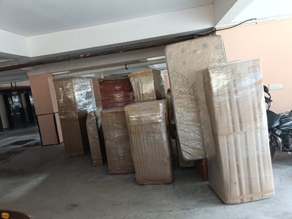 Cartons and furniture at a home – packers and movers in Lucknow